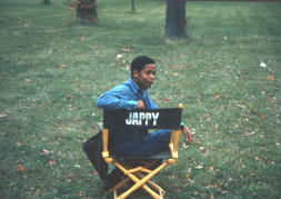 Actor Stephen Perry (Jappy) seated in his actor‚Äôs chair.